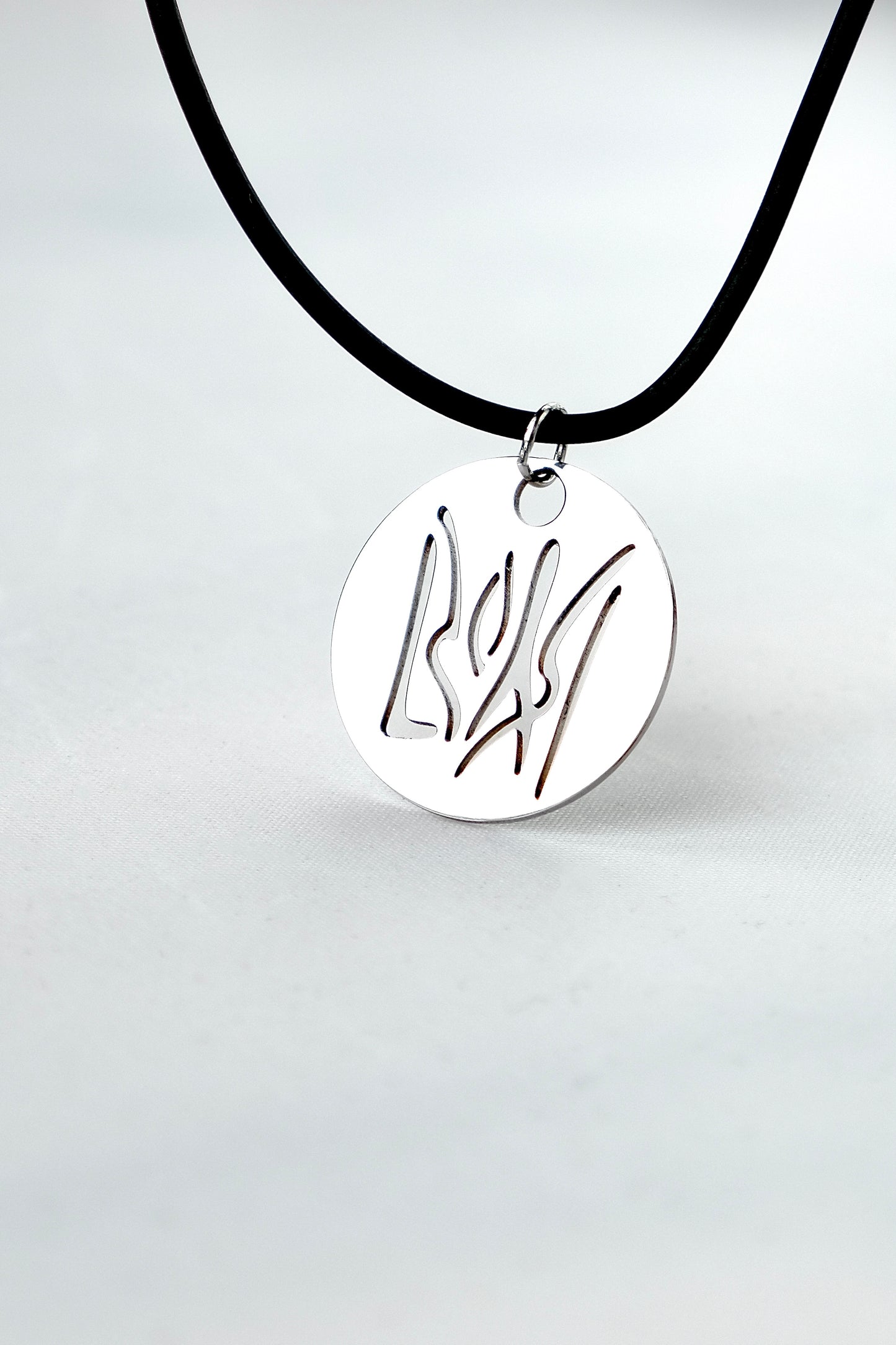Pendant with "Home" cutout